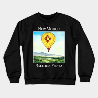 Hot air balloon flying over Albuquerque New Mexico during the Balloon Fiesta. Crewneck Sweatshirt